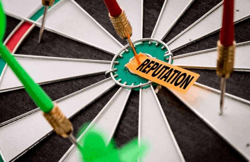 A dartboard with a tag saying 