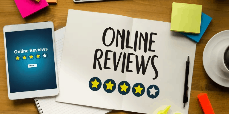 Online reviews written on a piece of paper with